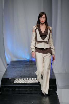 Model wearing white Abigail McCannon design