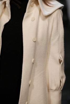 Model wearing white jacket Brooke Murphy