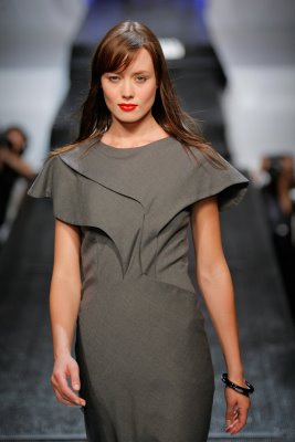 Model wearing grey Anna Arguello dress