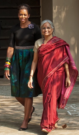 Visiting the Mahatma Gandhi Memorial in India in Dries Van Noten skirt.