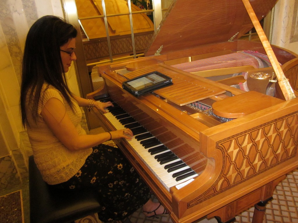 img_1584 The pianist at The Plaza plays music from her Kindle