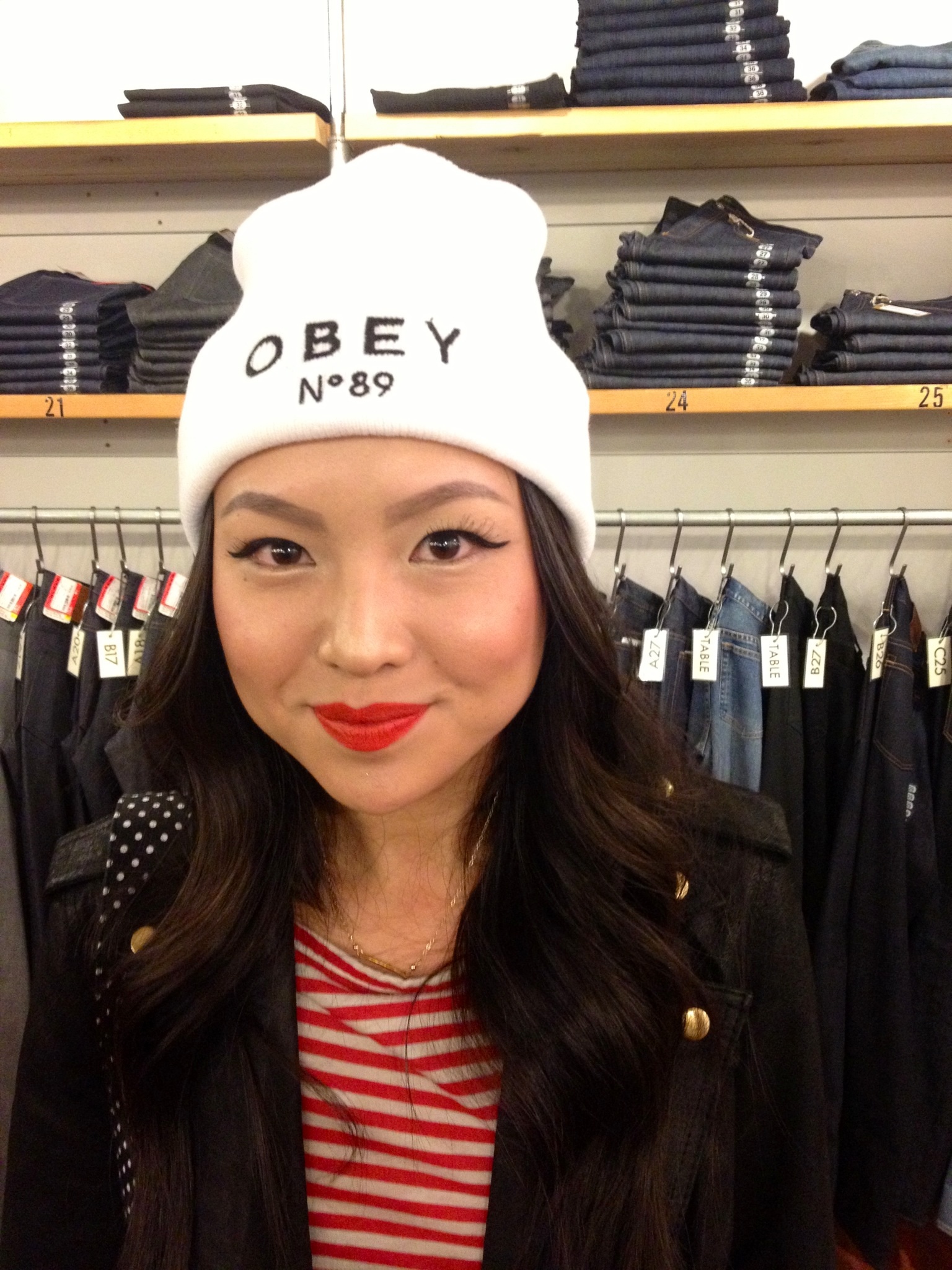 A guest sporting an OBEY beanie at the event.