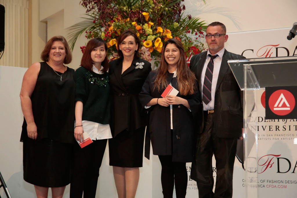 Lisa Smilor, Executive Director of the Council of Fashion Designers of America (CFDA), presenting BFA Fashion Design students Anh Phuong Thy Do and Pitzy Villagomez Ortega with CFDA Scholarship Awards along with Academy of Art University President Elisa Stephens and Academy of Art University School of Fashion Executive Director Simon Ungless 
